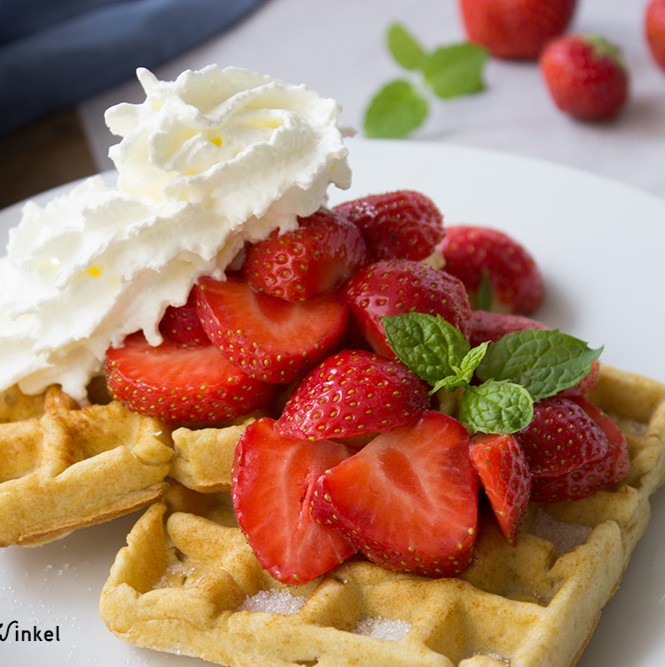 Wafel met slagroom en aardbeien